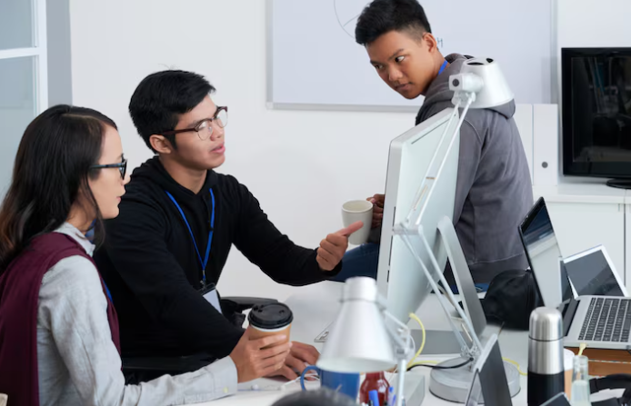 Group discussing ideas in office