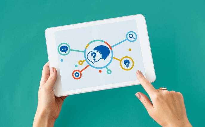 "Hands holding tablet displaying icons for search, shopping, and ideas."