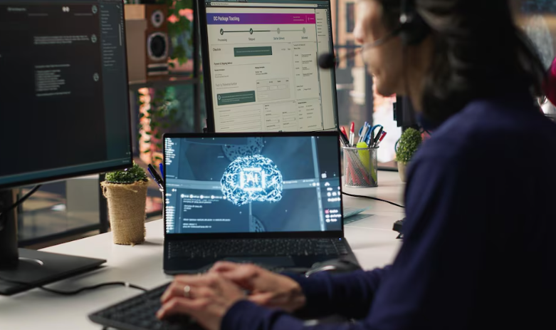 Developer coding with AI interface displayed on multiple computer screens