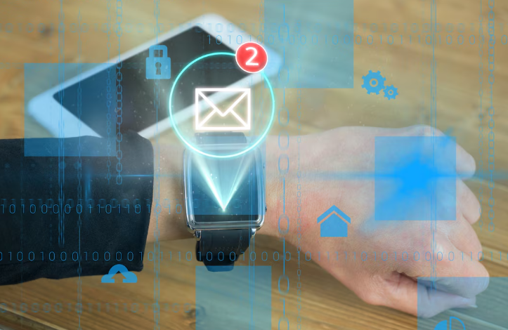 Smartwatch notification showing email alert with technology graphics overlay.