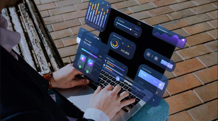 A laptop displaying floating digital analytics dashboards.