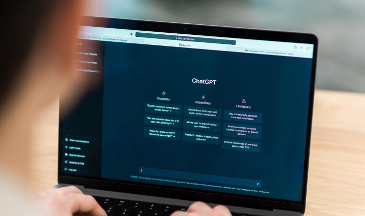 Exploring ChatGPT’s features on a laptop.