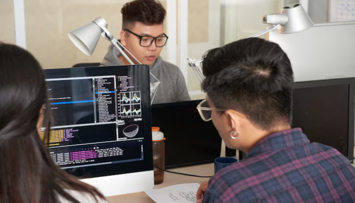 Developers coding and testing AI models together.