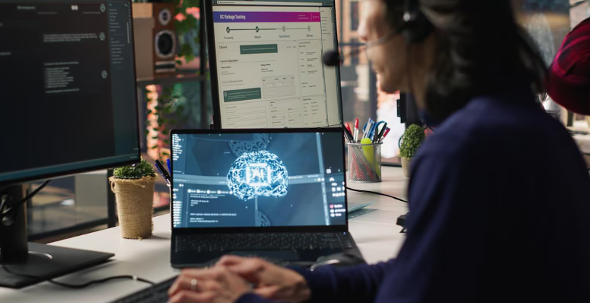 Developer analyzing AI models on multiple screens.