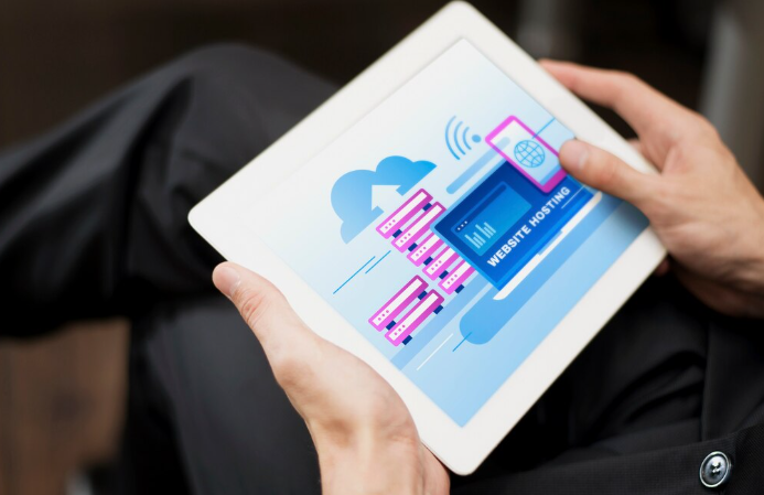 Person using tablet for website hosting