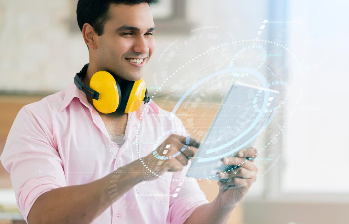 Person using tablet with headphones