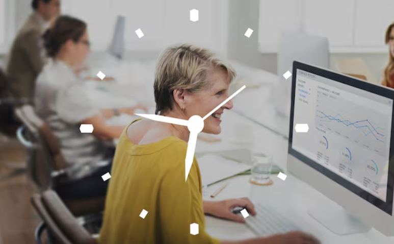 Smiling businesswoman working at desk with clock overlay.