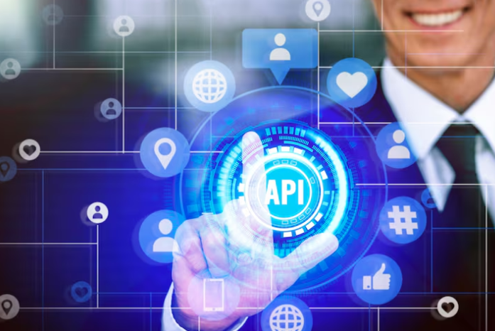 Businessman pressing virtual API button with digital icons