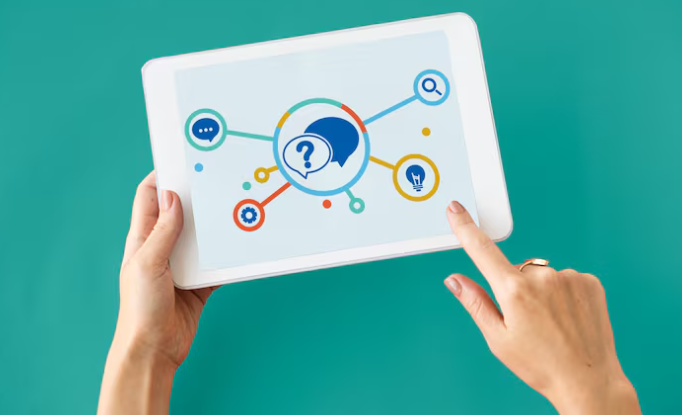 Person using tablet with connected icons for chat, search, and ideas.