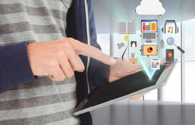 Person interacting with digital cloud data apps on tablet screen.