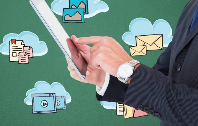 Businessman using digital tablet with cloud storage icons in background.
