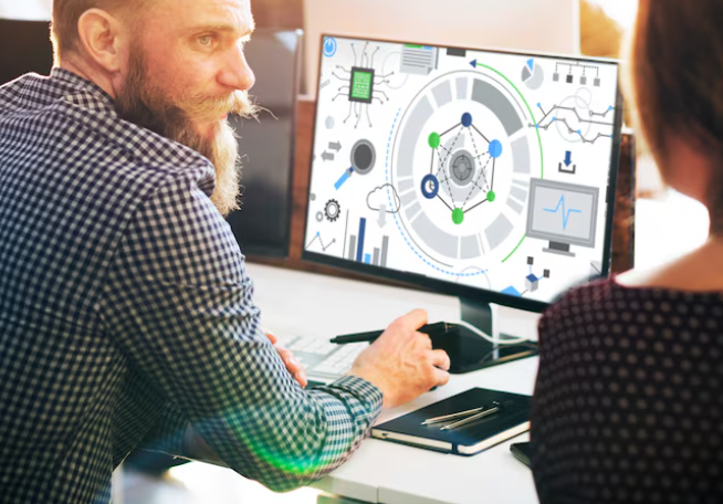 Man analyzing data visualization dashboard on computer.