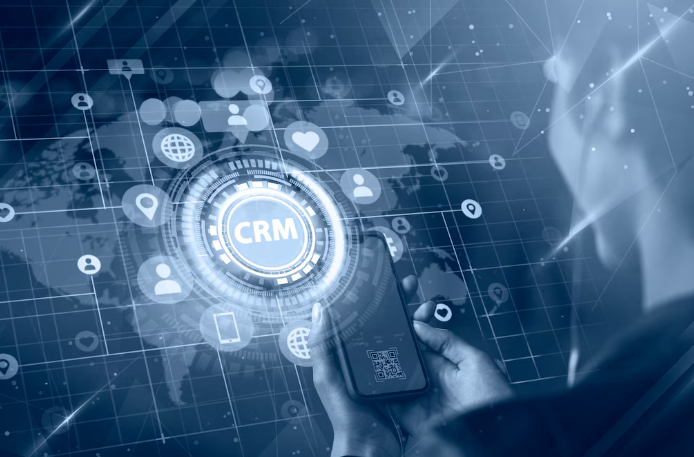 Person holding smartphone with glowing CRM interface and global network.