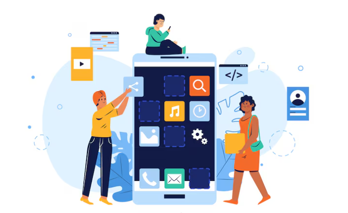 Team designing mobile application interface with large smartphone illustration.