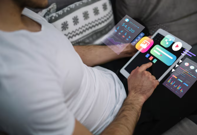 Man using tablet with futuristic holographic financial and app interfaces.