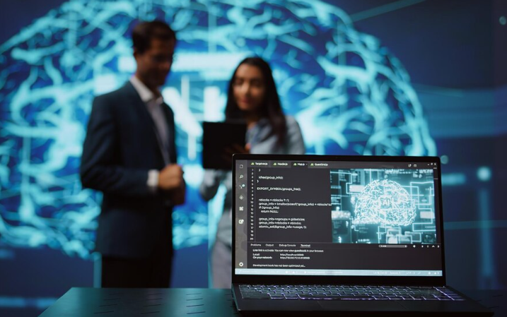 Laptop displaying code and brain graphic