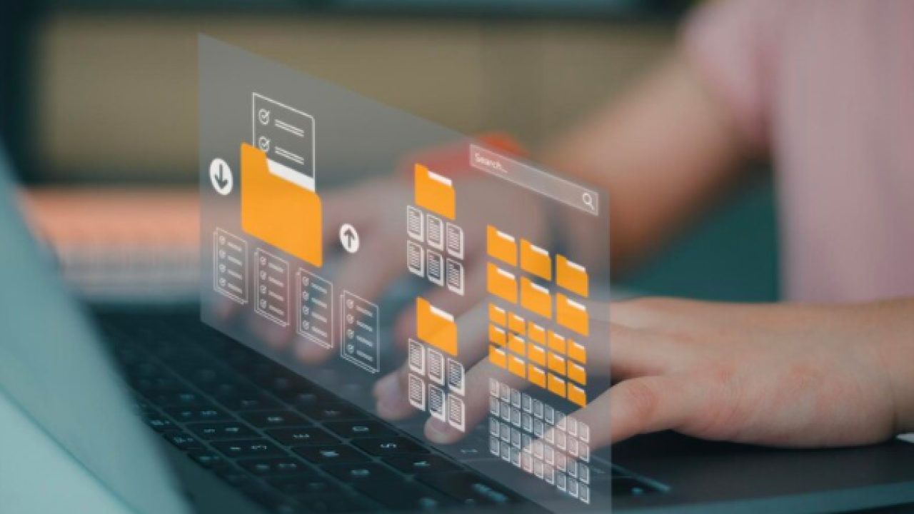 a person typing on a laptop